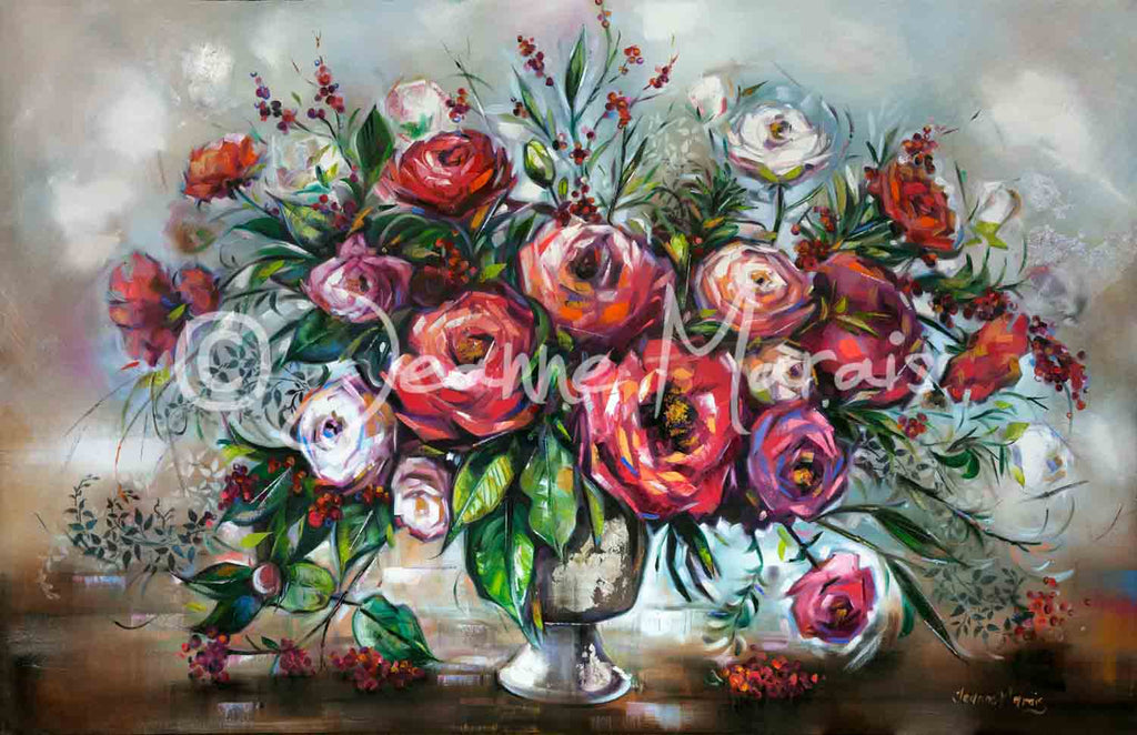 Colorful floral arrangement in a vase with a blurred background